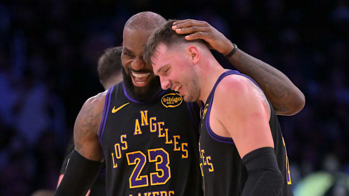 Los Angeles Lakers forward LeBron James (23) and Los Angeles Lakers guard Luka Doncic