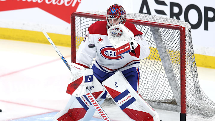 Feb 4, 2026; Winnipeg, Manitoba, CAN; Montreal Canadiens goaltender Samuel Montembeault (35) warms up before a game against the Winnipeg Jets  at Canada Life Centre. Mandatory Credit: James Carey Lauder-Imagn Images