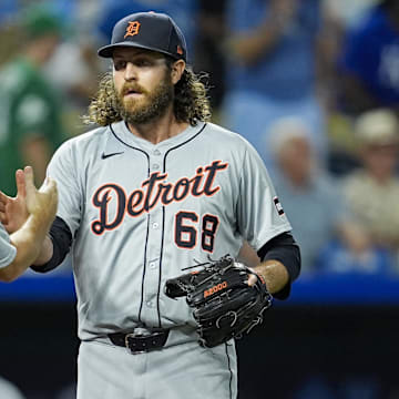 Sep 17, 2024; Kansas City, Missouri, USA; Detroit Tigers relief pitcher Jason Foley (68) celebrates with catcher Jake Rogers (34) after defeating the Kansas City Royals at Kauffman Stadium. 