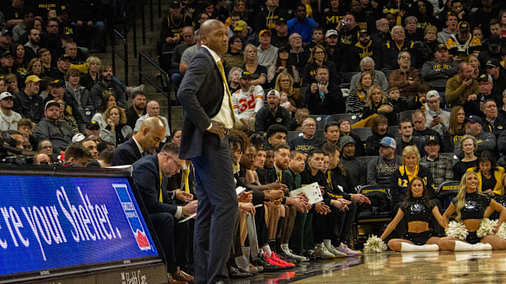 Jan. 18 2024; Columbia, Missouri, USA; Missouri Tigers head coach Dennis Gates and Arkansas Razorbacks head coach John Calipari walk on the sideline during a game a game at Mizzou Arena. 