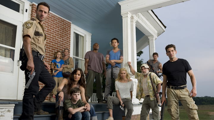 Andrew Lincoln, Madison Lintz, Melissa Suzanne McBride, Sarah Wayne Callies, Chandler Riggs, IronE Singleton, Steven Yeun, Laurie Holden, Jeffrey DeMunn, Norman Reedus, and Jon Bernthal - The Walking Dead _ Season 2 _ Gallery - Photo Credit: Matthew Welch/AMC