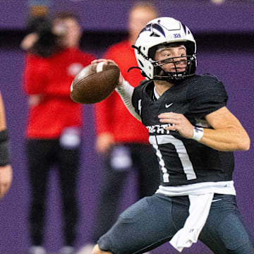 Liberty's Reece Rettig (17) looks to throw during the Class 5A semifinal against Southeast Polk on Friday, Nov. 15, 2024, at the UNI-Dome in Cedar Falls, IA.