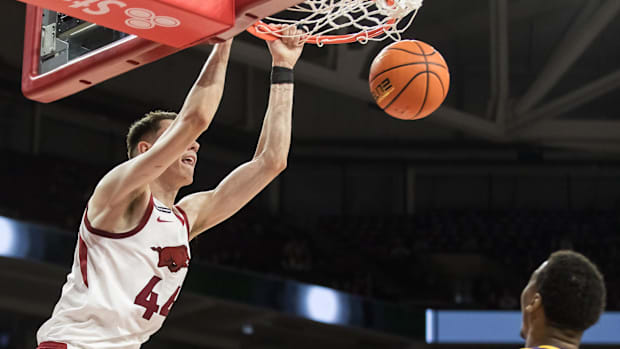 Arkansas Razorbacks forward Zvonimir Ivisic dunks against helpless LSU Tigers forward Robert Miller III