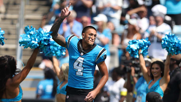 Sep 21, 2025; Charlotte, North Carolina, USA; Carolina Panthers wide receiver Tetairoa McMillan (4) runs onto the field before Atlanta Falcons game at Bank of America Stadium. Sep 21, 2025; Charlotte, North Carolina, USA; Carolina Panthers wide receiver Tetairoa McMillan (4) runs onto the field before Atlanta Falcons game at Bank of America Stadium.