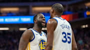 Dec 14, 2018; Sacramento, CA, USA; Golden State Warriors forward Draymond Green (23) and forward Kevin Durant (35) celebrate after defeating the Sacramento Kings at Golden 1 Center. Mandatory Credit: Ed Szczepanski-Imagn Images