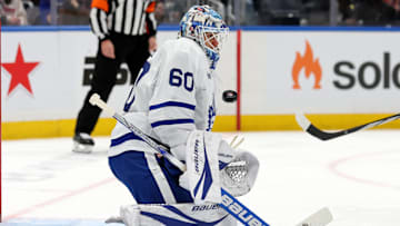 Jan 2, 2025; Elmont, New York, USA; Toronto Maple Leafs goaltender Joseph Woll (60) makes a save against the New York Islanders during the second period at UBS Arena. Mandatory Credit: Brad Penner-Imagn Images