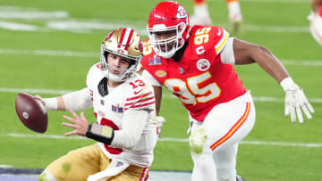 Feb 11, 2024; Paradise, Nevada, USA; San Francisco 49ers quarterback Brock Purdy (13) is pressured by Kansas City Chiefs defensive tackle Chris Jones (95) in the second half in Super Bowl LVIII at Allegiant Stadium. Mandatory Credit: Stephen R. Sylvanie-USA TODAY Sports