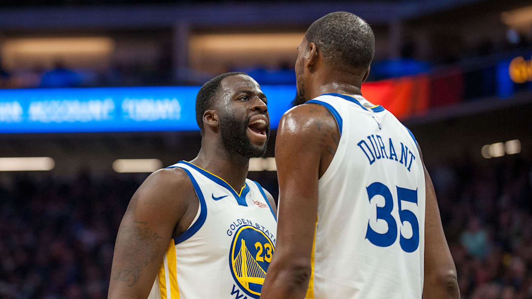 Dec 14, 2018; Sacramento, CA, USA; Golden State Warriors forward Draymond Green (23) and forward Kevin Durant (35) celebrate after defeating the Sacramento Kings at Golden 1 Center. Mandatory Credit: Ed Szczepanski-Imagn Images