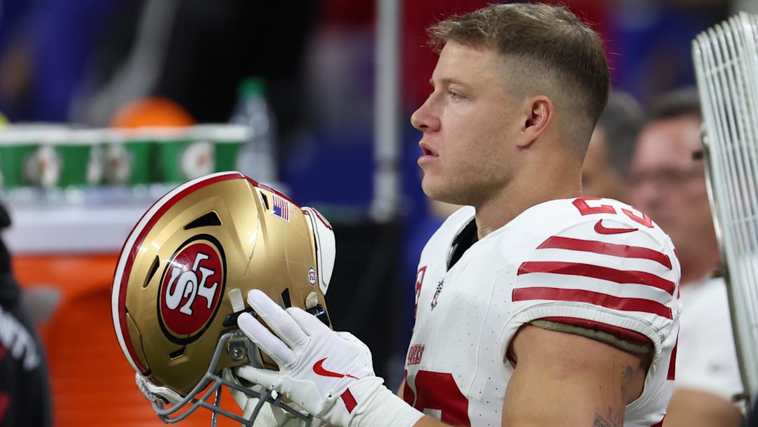 Dec 22, 2025; Indianapolis, Indiana, USA; San Francisco 49ers running back Christian McCaffrey (23) looks on before the game against the Indianapolis Colts at Lucas Oil Stadium.