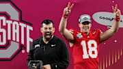 Ohio State Buckeyes head coach Ryan Day celebrates with quarterback Will Howard (18) following the 28-14 win over the Texas Longhorns in the Cotton Bowl Classic College Football Playoff semifinal game at AT&T Stadium in Arlington, Texas on Jan. 10, 2025.