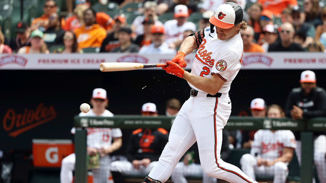 Apr 20, 2025; Baltimore, Maryland, USA; Baltimore Orioles shortstop Gunnar Henderson (2) reaches first base safely on a force out during the first inning against the Cincinnati Reds at Oriole Park at Camden Yards. Mandatory Credit: Daniel Kucin Jr.-Imagn Images