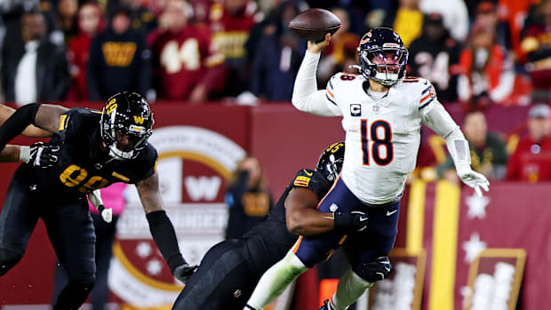 Washington Commanders defensive tackle Jer'Zhan Newton (95) rushes Chicago Bears quarterback Caleb Williams 