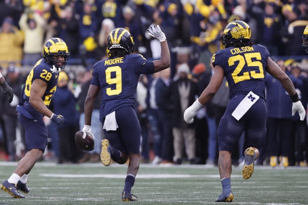 Michigan Wolverines defensive back Rod Moore celebrates after a game-winning interception against the Ohio State Buckeyes