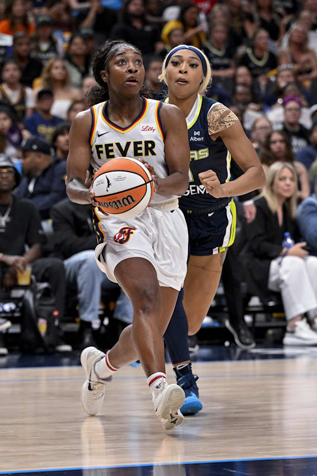Indiana Fever guard Aari McDonald and Dallas Wings guard DiJonai Carrington