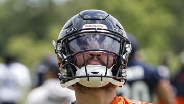 Jun 5, 2024; Lake Forest, IL, USA; Chicago Bears quarterback Caleb Williams (18) warms up during the team's minicamp at Halas Hall. Mandatory Credit: Kamil Krzaczynski-USA TODAY Sports