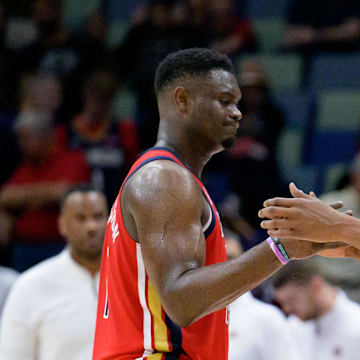 Apr 1, 2024; New Orleans, Louisiana, USA; New Orleans Pelicans forward Zion Williamson, left, congratulates Phoenix Suns forward Kevin Durant, right, after the Suns defeated the Pelicans at Smoothie King Center. Mandatory Credit: Matthew Hinton-Imagn Images