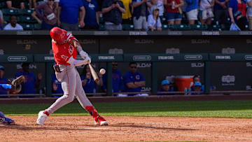 Feb 27, 2025; Mesa, Arizona, USA; Los Angeles Angels infielder Kyren Paris (19) hits a home run in the top of the ninth with two outs during a spring training game against the Chicago Cubs at Sloan Park to tie the game 4-4. Mandatory Credit: Allan Henry-Imagn Images