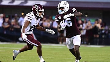 Aug 31, 2024; Starkville, Mississippi, USA; Mississippi State Bulldogs wide receiver Jordan Mosley (6) runs the ball while defended by Eastern Kentucky Colonels defensive back Sam Robertson (24) during the third quarter at Davis Wade Stadium at Scott Field. Mandatory Credit: Matt Bush-USA TODAY Sports
