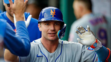 May 10, 2023; Cincinnati, Ohio, USA; New York Mets first baseman Pete Alonso (20) high fives teammates after hitting a solo home run in the second inning against the Cincinnati Reds at Great American Ball Park. Mandatory Credit: Katie Stratman-Imagn Images