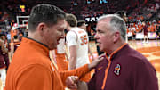 Mar 8, 2025; Clemson, SC, USA;  Clemson Head Coach Brad Brownell talks with Virginia Tech Mike Young before tipoff at Littlejohn Coliseum in Clemson, S.C Saturday, March 8, 2025.  Mandatory Credit: Ken Ruinard/USA TODAY Network via Imagn Images 