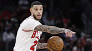 Oct 26, 2024; Chicago, Illinois, USA; Chicago Bulls guard Lonzo Ball (2) brings the ball up court against the Oklahoma City Thunder during the first half at United Center. Mandatory Credit: Kamil Krzaczynski-Imagn Images