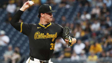 Jun 17, 2024; Pittsburgh, Pennsylvania, USA;  Pittsburgh Pirates starting pitcher Paul Skenes (30) delivers a pitch against the Cincinnati Reds during the first inning at PNC Park. Mandatory Credit: Charles LeClaire-USA TODAY Sports