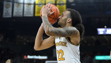 Feb 17, 2024; Providence, Rhode Island, USA; Providence Friars guard Devin Carter (22) shoots the ball against the DePaul Blue Demons during the first half at Amica Mutual Pavilion. Mandatory Credit: Eric Canha-USA TODAY Sports