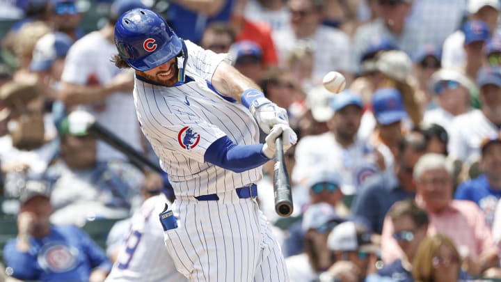Jun 19, 2024; Chicago, Illinois, USA; Chicago Cubs shortstop Dansby Swanson (7) hits a solo home run against the Chicago Cubs during the fourth inning at Wrigley Field.