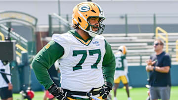 Jun 11, 2025; Green Bay, WI, USA;  Green Bay Packers offensive tackle Jordan Morgan (77) participates in the team's minicamp at Ray Nitschke Field.