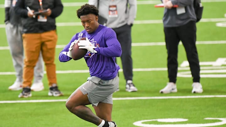 Former Clemson linebacker Barrett Carter perform linebacker position drill for NFL Scouts at Clemson Football's 2025 Pro Day featured seven former football players, five showing speed and skills for NFL scouts before the draft April 24-26 in Green Bay. Former Clemson offensive lineman Marcus Page and Former Clemson running back Phil Mafah interviewed but will show at a future workout.