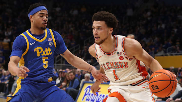 Jan 18, 2025; Pittsburgh, Pennsylvania, USA; Clemson Tigers guard Chase Hunter (1) drives to the basket against Pittsburgh Panthers guard Ishmael Leggett (5) during the first half at the Petersen Events Center. 