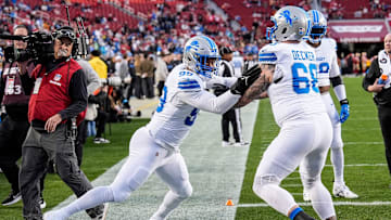 Detroit Lions defensive end Za'Darius Smith (99), left, practices with offensive tackle Taylor Decker (68) at warm up before the game between San Francisco 49ers and Detroit Lions at Levi's Stadium in Santa Clara, Calif. on Monday, Dec. 30, 2024.