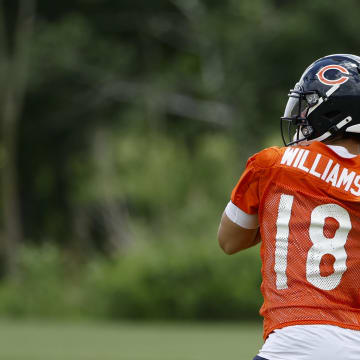 Jun 5, 2024; Lake Forest, IL, USA; Chicago Bears quarterback Caleb Williams (18) looks to pass the ball during the team's minicamp at Halas Hall. Mandatory Credit: Kamil Krzaczynski-USA TODAY Sports
