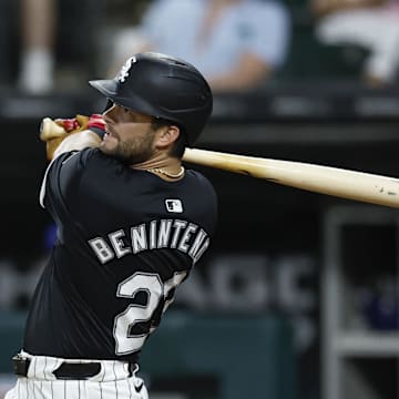 Chicago White Sox outfielder Andrew Benintendi (23) hits a two-run double against the Texas Rangers during the first inning of game two of the doubleheader at Guaranteed Rate Field in 2024.