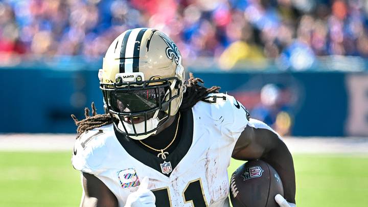 Sep 28, 2025; Orchard Park, New York, USA; New Orleans Saints running back Alvin Kamara (41) carries the ball against the Buffalo Bills in the third quarter at Highmark Stadium. Mandatory Credit: Mark Konezny-Imagn Images