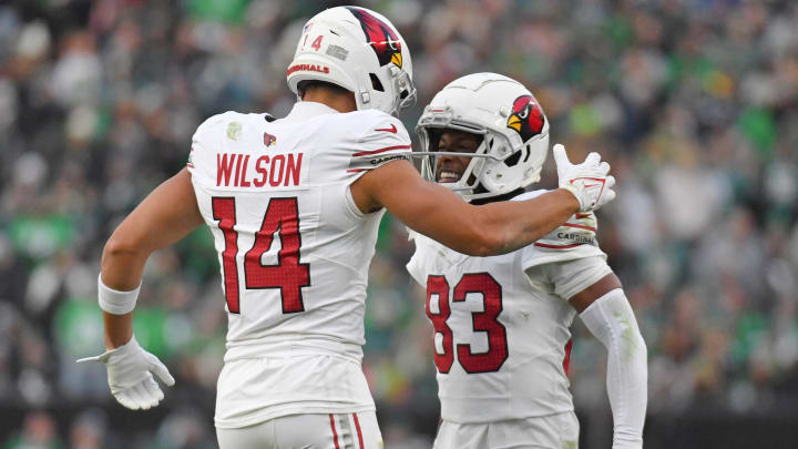 Dec 31, 2023; Philadelphia, Pennsylvania, USA; Arizona Cardinals wide receiver Michael Wilson (14) and wide receiver Greg Dortch (83) celebrate during the fourth quarter against the Philadelphia Eagles at Lincoln Financial Field. Mandatory Credit: Eric Hartline-USA TODAY Sports