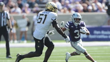 Kansas State Wildcats running back Dylan Edwards (3) runs the ball during the second half of the game against UCF Knights at Bill Snyder Family Stadium on Sept. 27, 2025.