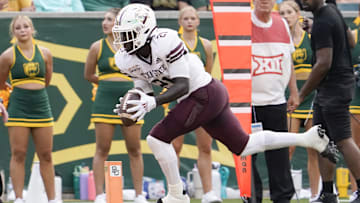 Sep 2, 2023; Waco, Texas, USA; Texas State Bobcats running back Ismail Mahdi (21) goes in for the 10-yard touchdown catch Baylor Bears during the first half at McLane Stadium