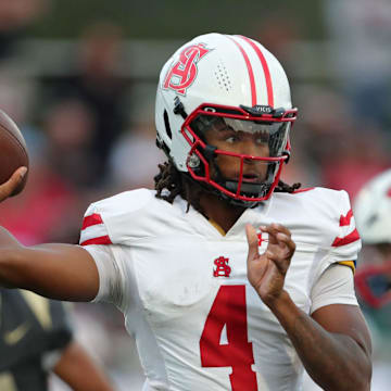 Spalding quarterback Malik Washington throws against Hoban during the first half of a high school football game, Friday, Aug. 23, 2024, in Akron, Ohio.