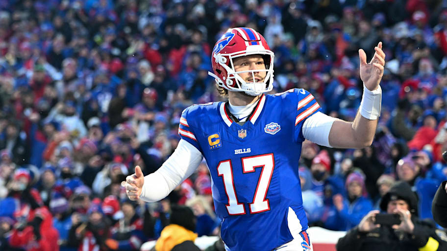 Buffalo Bills quarterback Josh Allen runs onto the field before the game against the New York Jets.