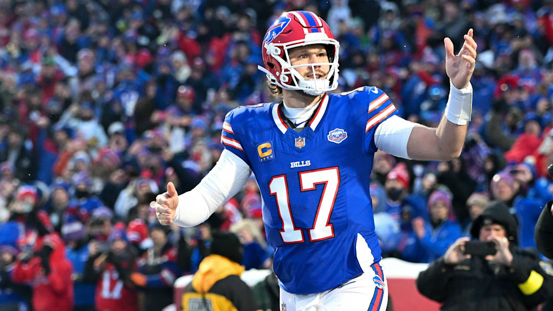 Jan 4, 2026; Orchard Park, New York, USA; Buffalo Bills quarterback Josh Allen (17) runs onto the field before the game against the New York Jets at Highmark Stadium.