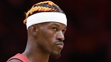 Dec 12, 2024; Miami, Florida, USA;  Miami Heat forward Jimmy Butler (22) stands on the court during a time out against the Toronto Raptors  during the first half at Kaseya Center. Mandatory Credit: Rhona Wise-Imagn Images