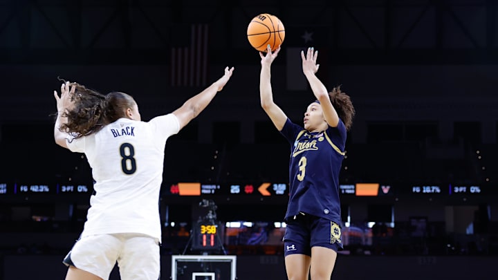 Mar 27, 2026; Fort Worth, TX, USA;  Notre Dame Fighting Irish guard Hannah Hidalgo (3) shoots as Vanderbilt Commodores forward Ava Black (8) defends during the first half at Dickies Arena. Mandatory Credit: Chris Jones-Imagn Images