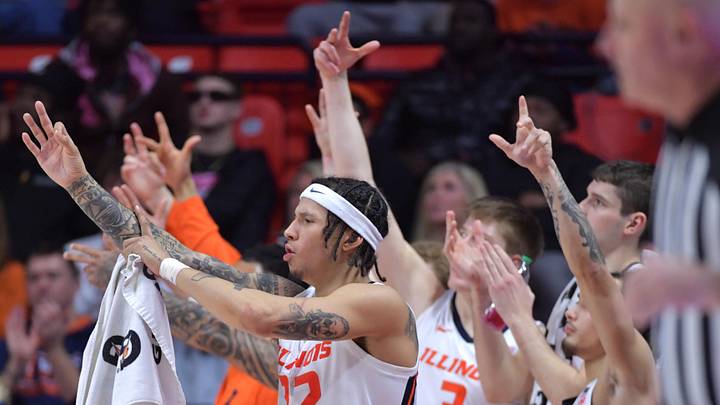 Jan 8, 2025; Champaign, Illinois, USA;  Illinois fighting Illini players celebrate their 91-52 win over the Penn State Nittany Lions  during the second half at State Farm Center. Mandatory Credit: Ron Johnson-Imagn Images