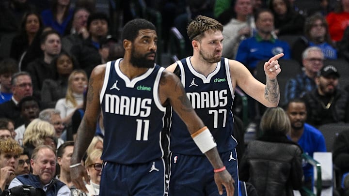 Jan 3, 2024; Dallas, Texas, USA; Dallas Mavericks guard Kyrie Irving (11) and guard Luka Doncic (77) face the Portland Trail Blazers attack during the second half at the American Airlines Center. Mandatory Credit: Jerome Miron-Imagn Images