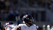 Nov 1, 2025; Berkeley, California, USA; Virginia Cavaliers quarterback Chandler Morris (4) drops to pass against the California Golden Bears during the second quarter at California Memorial Stadium. Mandatory Credit: D. Ross Cameron-Imagn Images