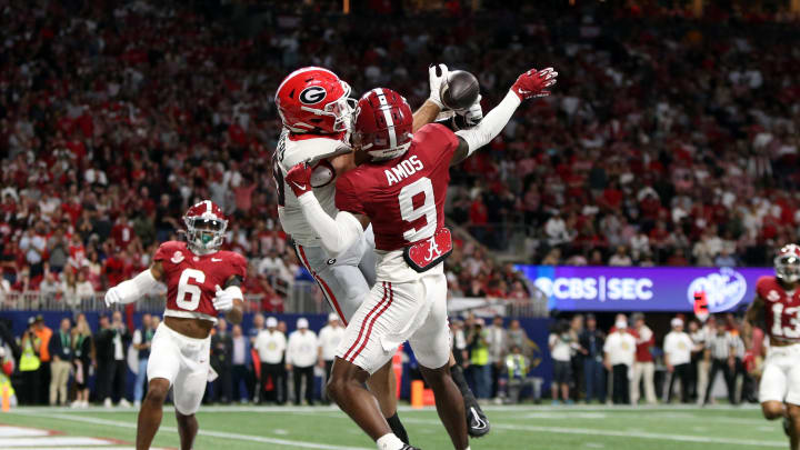 Dec 2, 2023; Atlanta, GA, USA; Georgia Bulldogs tight end Brock Bowers (19) cannot make a catch against Alabama Crimson Tide defensive back Trey Amos (9) in the third quarter at Mercedes-Benz Stadium. Mandatory Credit: Brett Davis-USA TODAY Sports