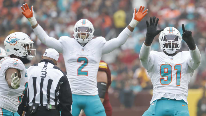 Dec 3, 2023; Landover, Maryland, USA; Miami Dolphins defensive end Emmanuel Ogbah (91) celebrates after recording a sack against the Washington Commanders during the second quarter at FedExField. Mandatory Credit: Geoff Burke-USA TODAY Sports