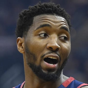 Cleveland Cavaliers guard Donovan Mitchell stands on the court in the first quarter against the Philadelphia 76ers.