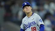 Oct 31, 2025; Toronto, Ontario, CAN; Los Angeles Dodgers pitcher Yoshinobu Yamamoto (18) reacts in the fifth inning against the Toronto Blue Jays during game six of the 2025 MLB World Series at Rogers Centre. Mandatory Credit: John E. Sokolowski-Imagn Images